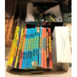 A box containing various childrens cartoon annuals including The Beano Book 1977-1983 inclusive,