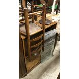 A mid-20th Century oak bookcase with glazed doors together an elm panel seated chair,