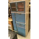 A vintage blue and white painted kitchen cabinet together with a Lebus oak single door wardrobe and