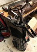 A Biomagnetic Dual Strap golf bag and contents of eighteen various golf clubs including Precision,