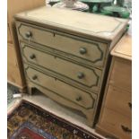 An early 19th Century painted pine chest of three long drawers raised on bracket feet