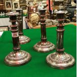 A set of four George III Sheffield plated telescopic candlesticks with beaded decoration by Matthew