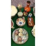A collection of various Chinese and Japanese china wares to include Chinese baluster shaped vase,