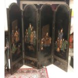 A Chinese black laquered and gilt four fold screen, decorated with figures on each panel,