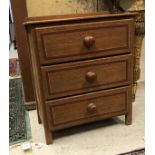 A 19th Century painted pine chest of three drawers of small proportions