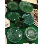 A collection of ten 19th Century Wedgwood green basketwork plates together with five various