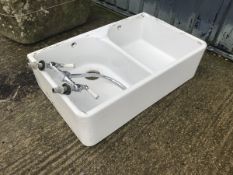 A twin Belfast sink with tap unit