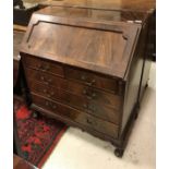 A mahogany bureau in the Georgian style