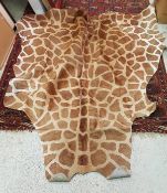 A "Giraffe" print cowhide rug