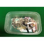 A box of assorted silver and other costume jewellery