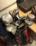 A golf bag and contents of Spalding Progen,
