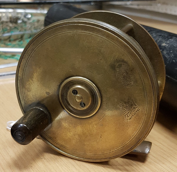 A Hardy brass Birmingham 4½" plate wind reel