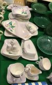 A Carlton ware hand painted collection of tea/dinner wares in relief work Convolvulus pattern