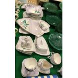 A Carlton ware hand painted collection of tea/dinner wares in relief work Convolvulus pattern