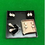 Four pairs of white metal mounted and rose quartz earrings