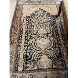 A silk mix prayer rug,