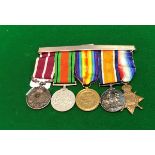 A medal bar comprising three World War I medals, the 1914-15 Star,