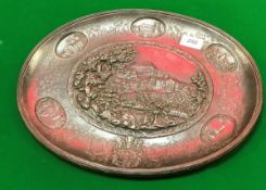 A 19th Century German cast iron plaque depicting various grand houses and coat of arms stamped
