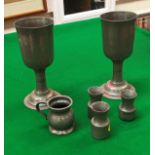 A collection of mainly 19th Century pewter wares, to include a pair of stemmed goblets,