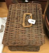 A coracle wicker picnic set containing kettle and burner,
