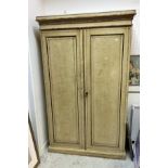 A Victorian painted pine double wardrobe in simulated bird's eye maple,