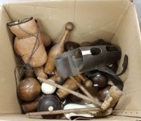 A box of various sporting requisites to include brown leather boxing gloves, skittles,