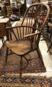 A set of four modern ash and oak Thames Valley style stick-back chairs on turned legs united by