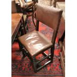 A matched set of eight oak and studded leather covered dining chairs in the Cromwellian manner