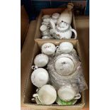 A box containing various Wedgwood Kutani Crane coffee wares,