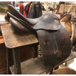 A general purpose brown leather saddle