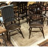 A pair of 19th Century stick back elbow chairs raised on ringed and turned front legs to H