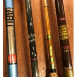 A collection of four various fly fishing rods including a Hardy salmon fly No.