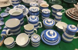 A collection of T G Green & Co Cornish ware blue and white striped dinner and serving wares