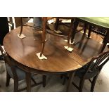 A mahogany D end dining table with additional leaf