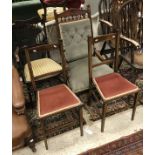 A Victorian walnut framed salon chair with button back raised on ringed and turned legs together