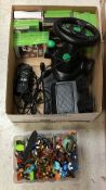 A box containing XBox 360 console, various games,