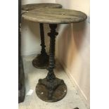 A pair of tall pub tables,