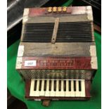 A Ludwig accordion "Piano-Tone Down South Tremolo Concert" in simulated rosewood case