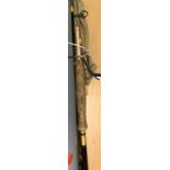 A collection of various fishing requisites including a pair of Ronny waders, wading staff,