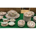 An Ashworths Ironstone Oriental design dinner service comprising thirty-nine large plates,