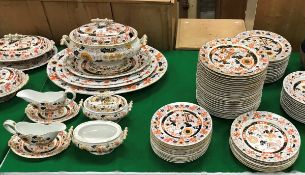 An Ashworths Ironstone Oriental design dinner service comprising thirty-nine large plates,