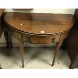 A 19th Century mahogany tea table of demi-lune form,