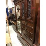 A Victorian mahogany wardrobe compactum,