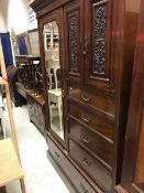 A Victorian mahogany wardrobe compactum,