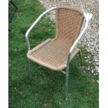 A set of twelve simulated canework aluminium framed garden chairs