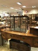 A circa 1900 mahogany framed and glazed shop table top display cabinet with rear sliding doors