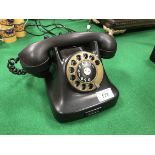 A vintage GPO black bakelite cased telephone No'd to base "213.251B-F.