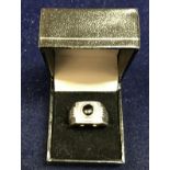 A gentleman's 9 carat white gold onyx and diamond set ring,