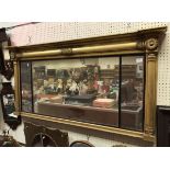 A Victorian gilt framed over mantel mirror with acanthus capped column decoration
