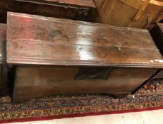 An 18th Century oak hutch with moulded and notch carved decoration raised on bracket feet